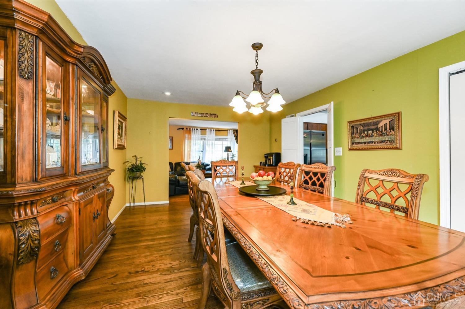 50 Clive Hills Road Edison, NJ 08820 - Photo 12 of 32 a view of a dining room with furniture