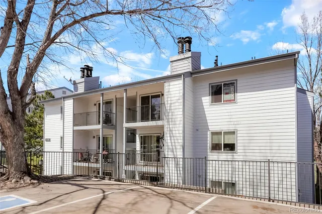 a front view of a house with a glass windows