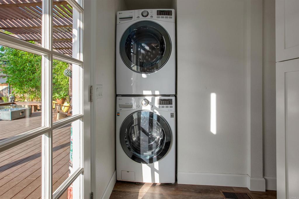 906 Leonard Avenue Oceanside, CA 92054 - Photo 18 of 53 a view of a hallway with washer and dryer