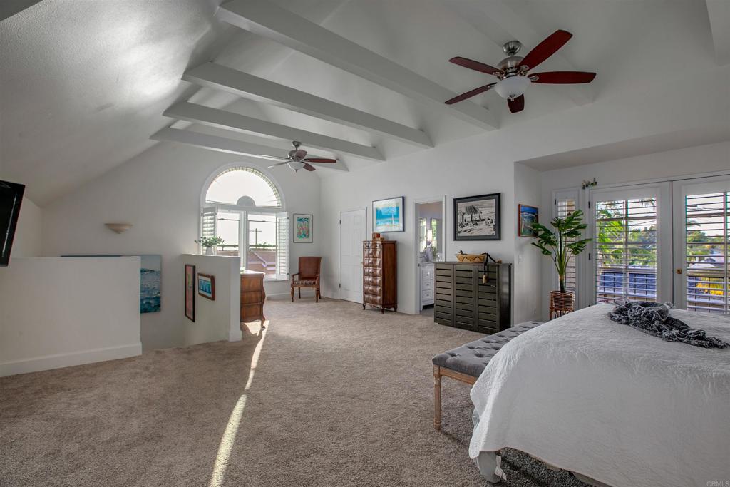 906 Leonard Avenue Oceanside, CA 92054 - Photo 30 of 53 a living room with furniture a window and potted plants on the table