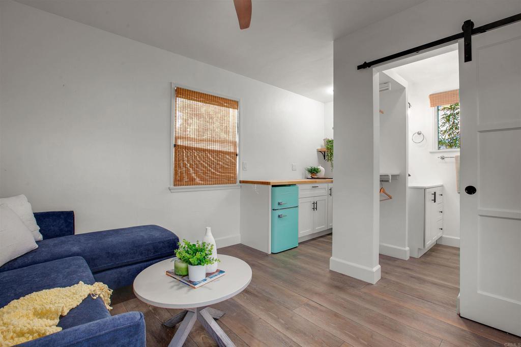 906 Leonard Avenue Oceanside, CA 92054 - Photo 37 of 53 a living room with furniture and a table