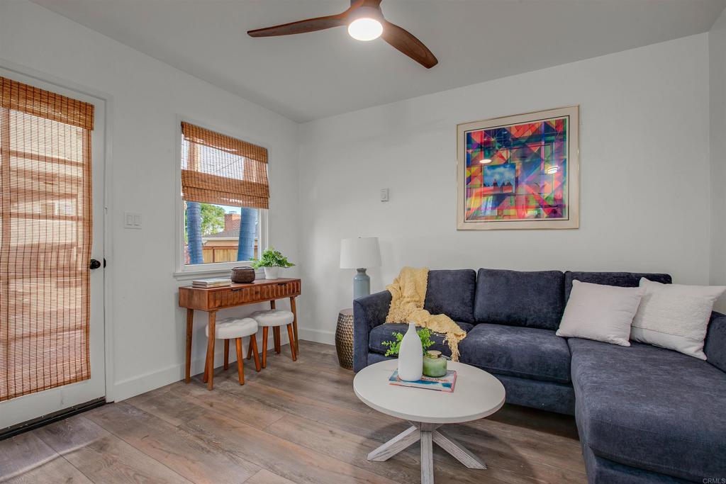 906 Leonard Avenue Oceanside, CA 92054 - Photo 38 of 53 a living room with furniture and a potted plant