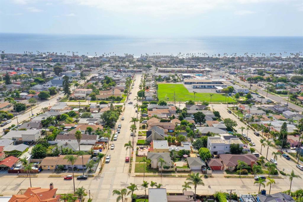 906 Leonard Avenue Oceanside, CA 92054 - Photo 5 of 53 an aerial view of a city with lots of residential buildings