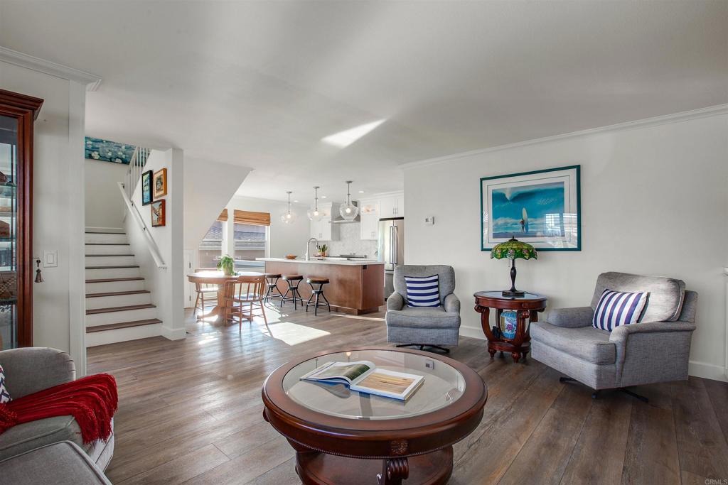 906 Leonard Avenue Oceanside, CA 92054 - Photo 8 of 53 a living room with furniture and a wooden floor