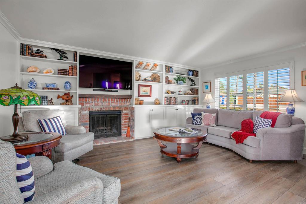 906 Leonard Avenue Oceanside, CA 92054 - Photo 9 of 53 a living room with furniture and a fireplace