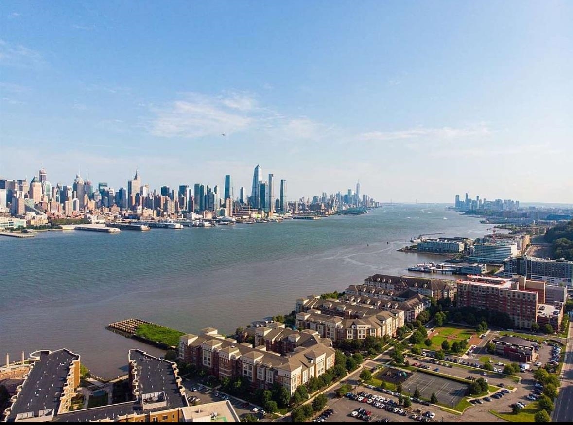 6010 Boulevard East West New York, NJ 07093 - Photo 27 of 27 a view of a lake with a large mountain