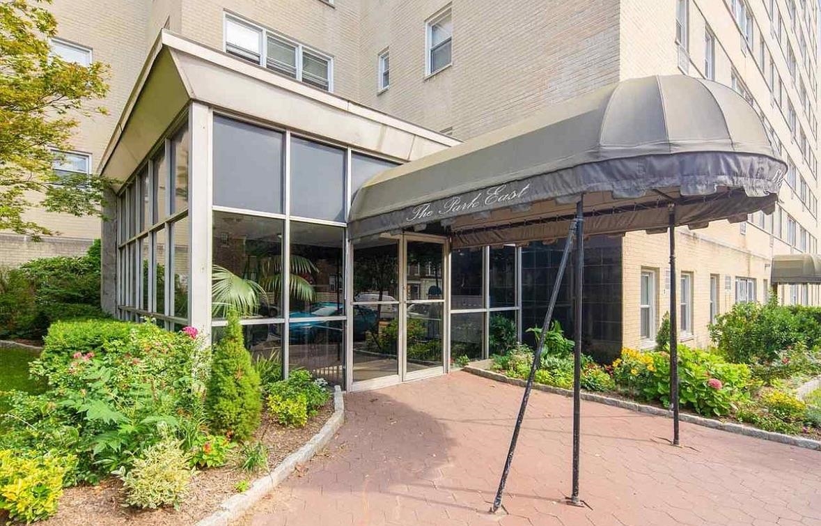 6010 Boulevard East West New York, NJ 07093 - Photo 3 of 27 a house view with a garden space