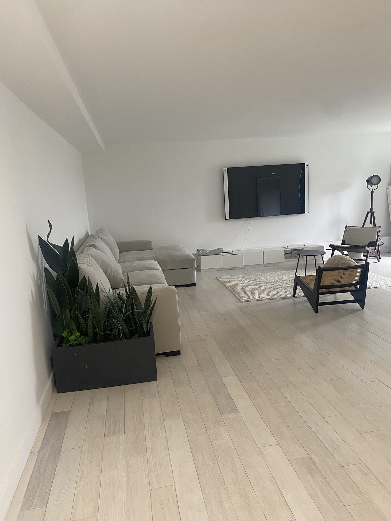 6010 Boulevard East West New York, NJ 07093 - Photo 8 of 27 a living room with furniture and a couch