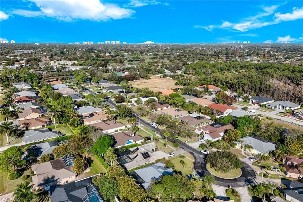 302 Sawgrass Court Naples, FL 34110 - Photo 32 of 40 a view of a city