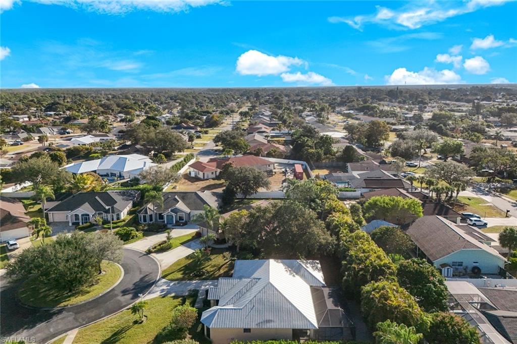 302 Sawgrass Court Naples, FL 34110 - Photo 33 of 40 an aerial view of a