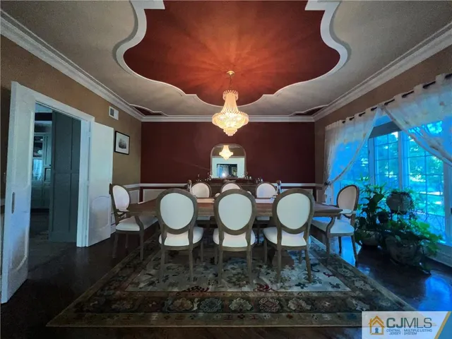 a kitchen with stainless steel appliances granite countertop a stove and a refrigerator