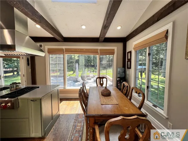 a bedroom with a bed and a television