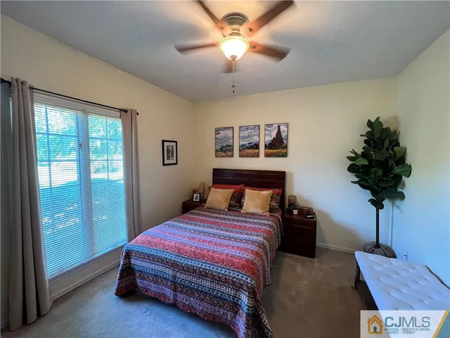 a bathroom with a toilet and shower