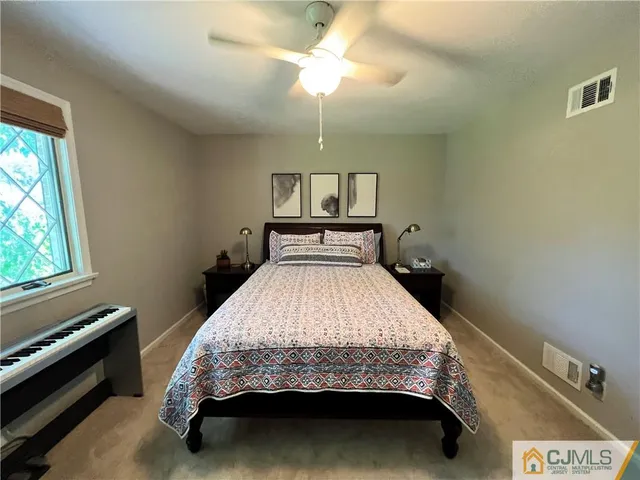 a bathroom with a sink a vanity and a mirror