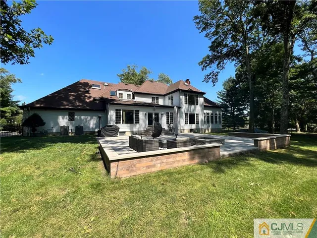 a view of a park with large trees