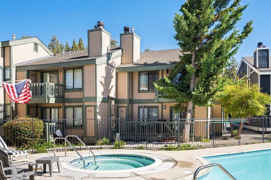 760 Blue Jay Road, Unit 48 Big Bear Lake, CA 92315 - Photo 20 of 31 a front view of houses with yard