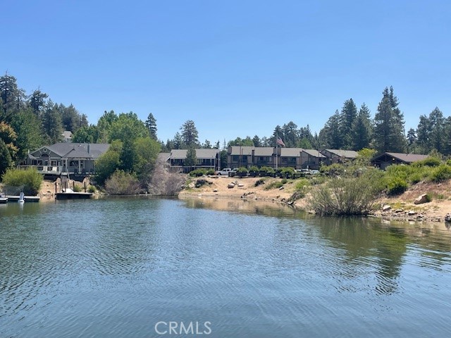 760 Blue Jay Road, Unit 48 Big Bear Lake, CA 92315 - Photo 25 of 31 a view of a lake with houses
