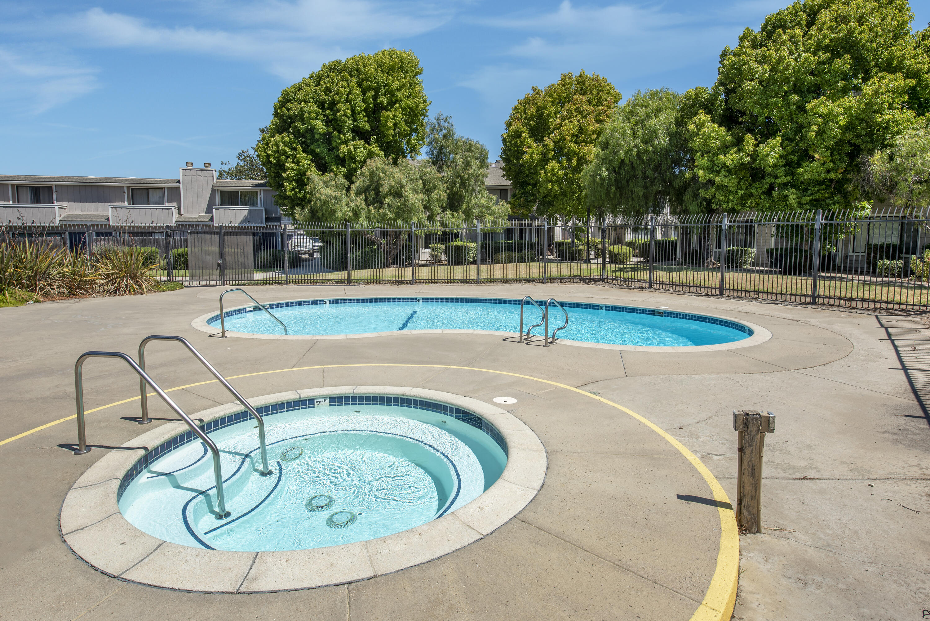214 North R Street Lompoc, CA 93436 - Photo 15 of 15 a view of a swimming pool with a patio