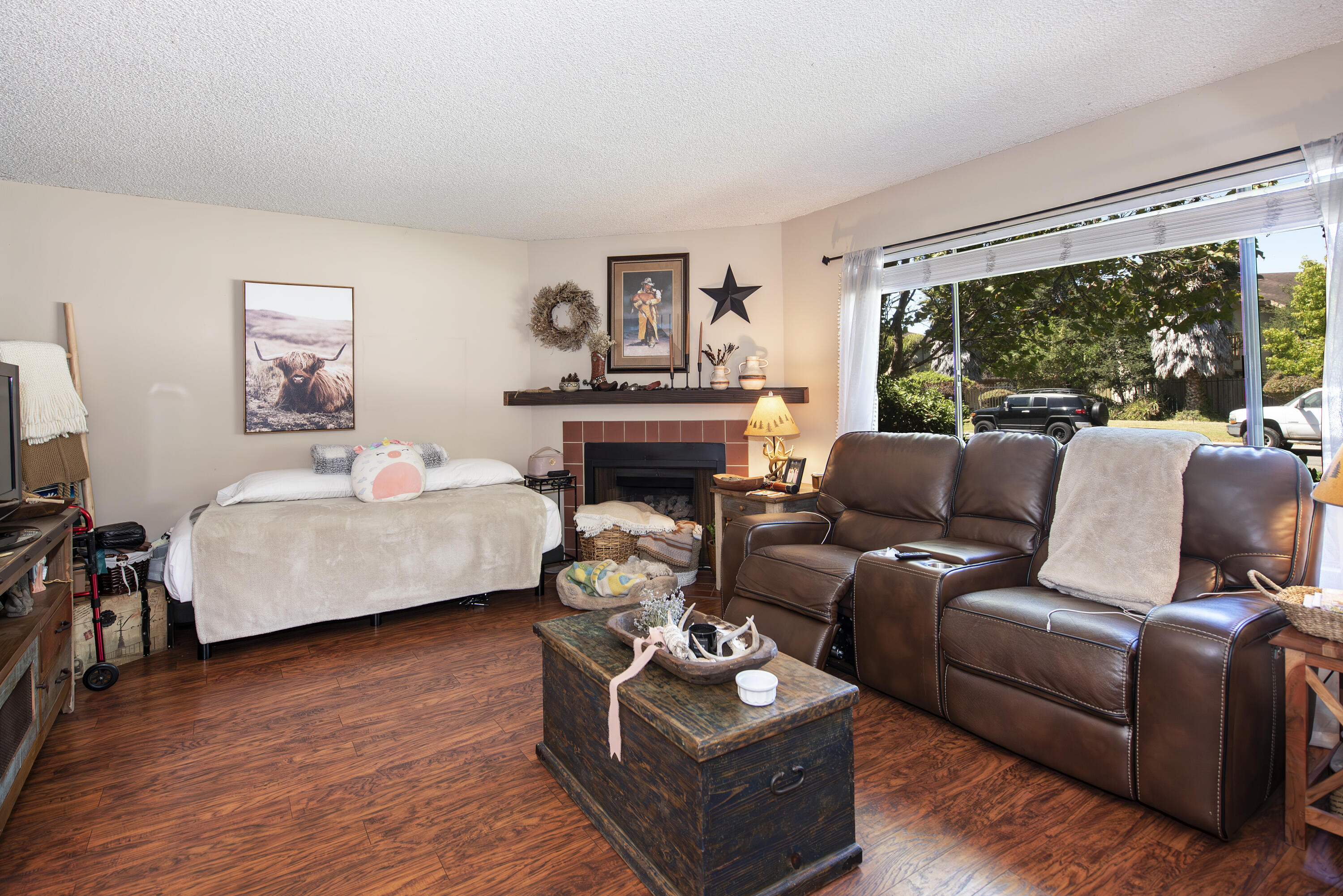 214 North R Street Lompoc, CA 93436 - Photo 3 of 15 a living room with furniture and a fireplace
