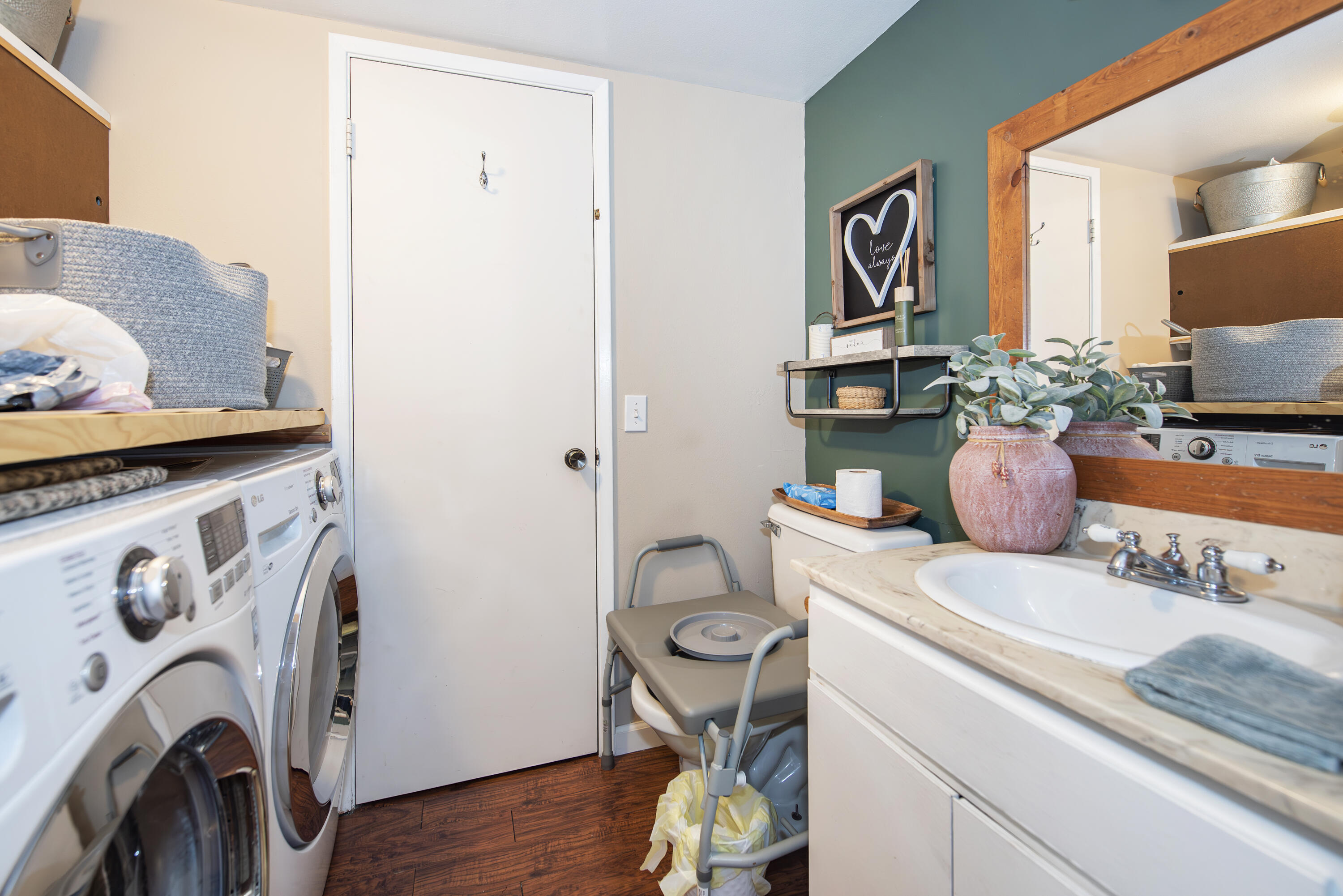 214 North R Street Lompoc, CA 93436 - Photo 4 of 15 a room with a washing machine and sink