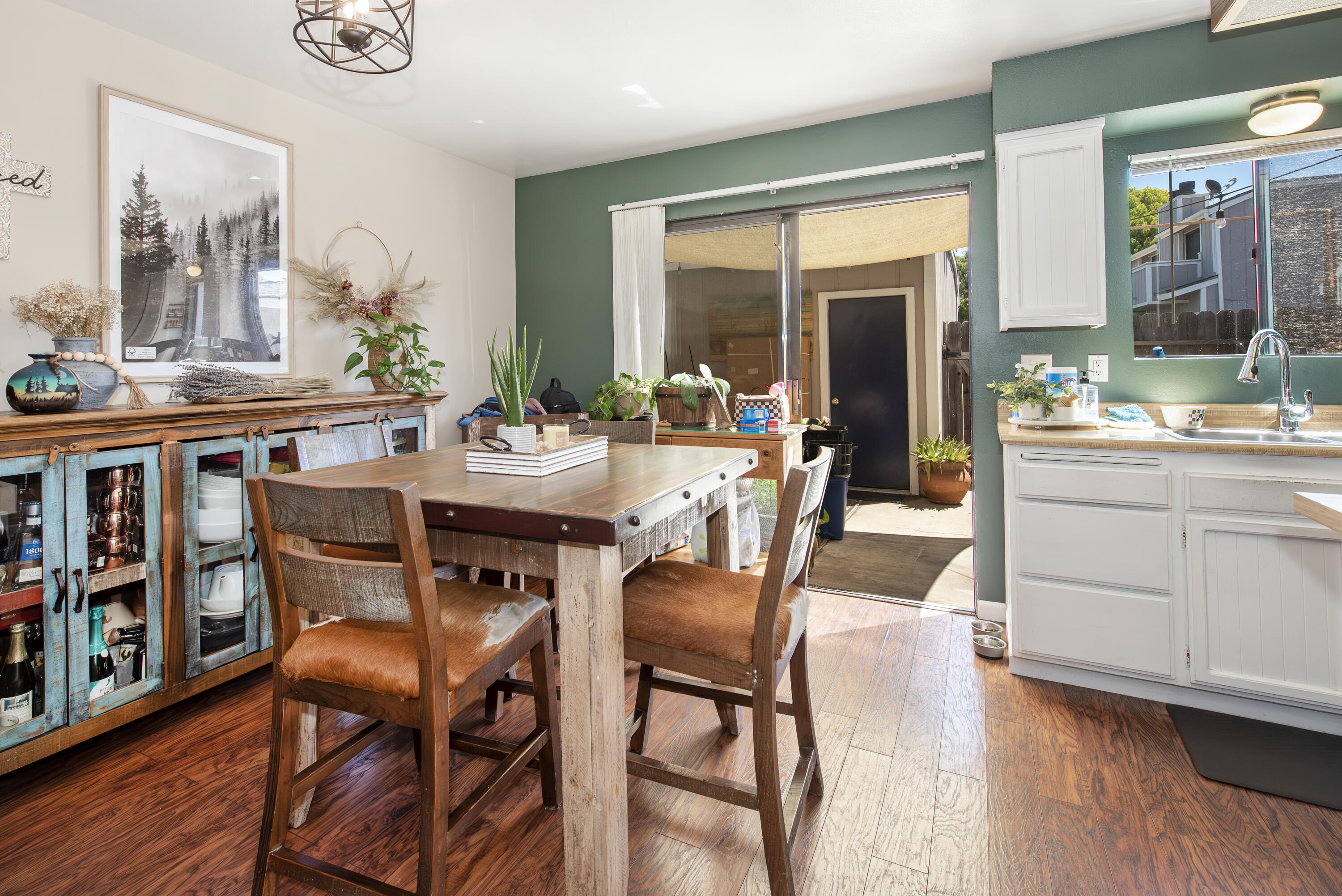 214 North R Street Lompoc, CA 93436 - Photo 5 of 15 a view of a dining room with furniture and wooden floor