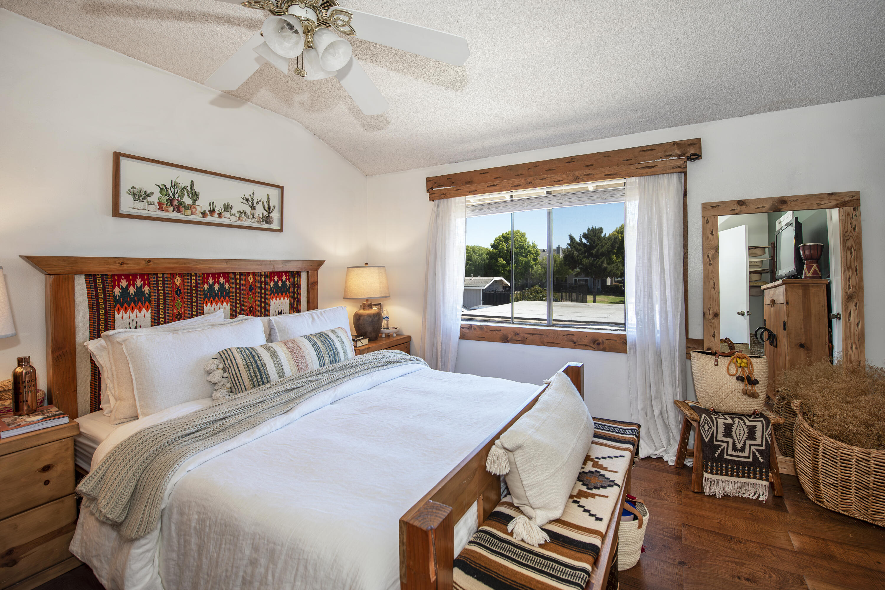 214 North R Street Lompoc, CA 93436 - Photo 7 of 15 a bedroom with furniture and a large window