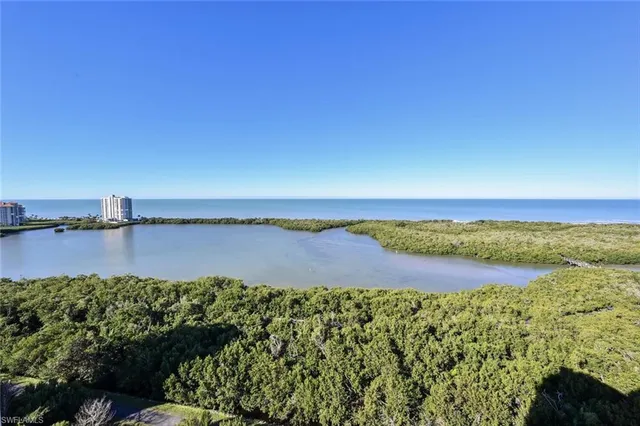a view of lake with green space