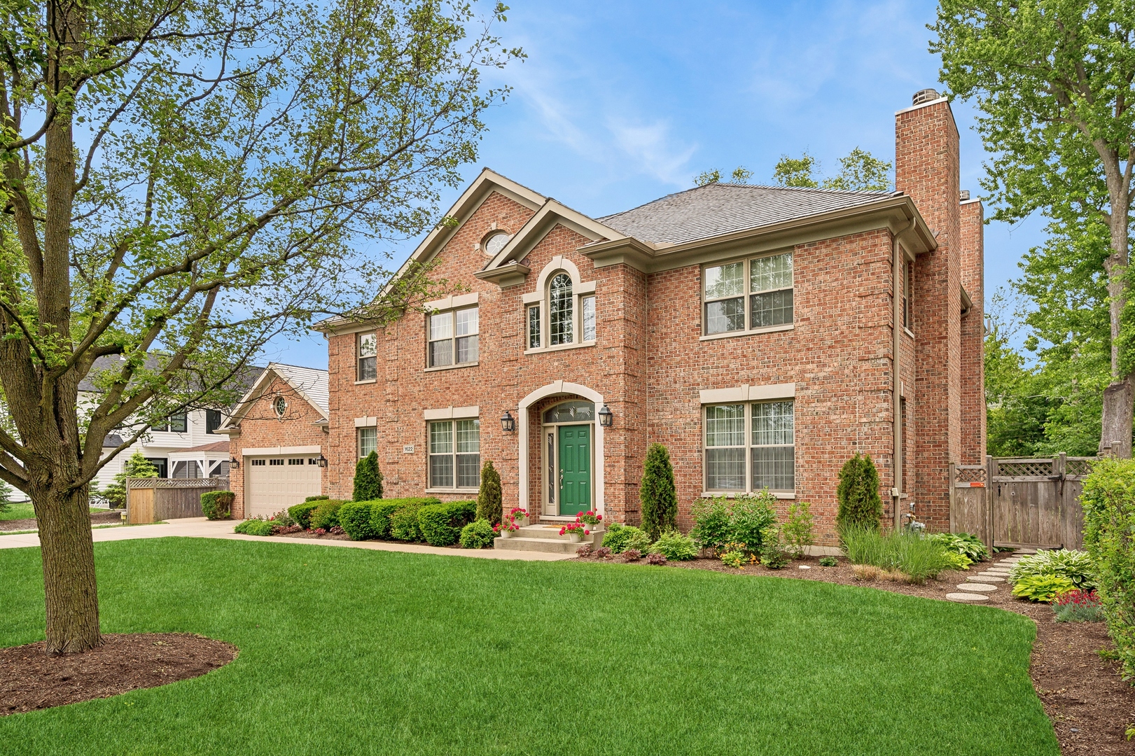 1622 Brandon Road Glenview, IL 60025 - Photo 1 of 31 a front view of a house with a yard