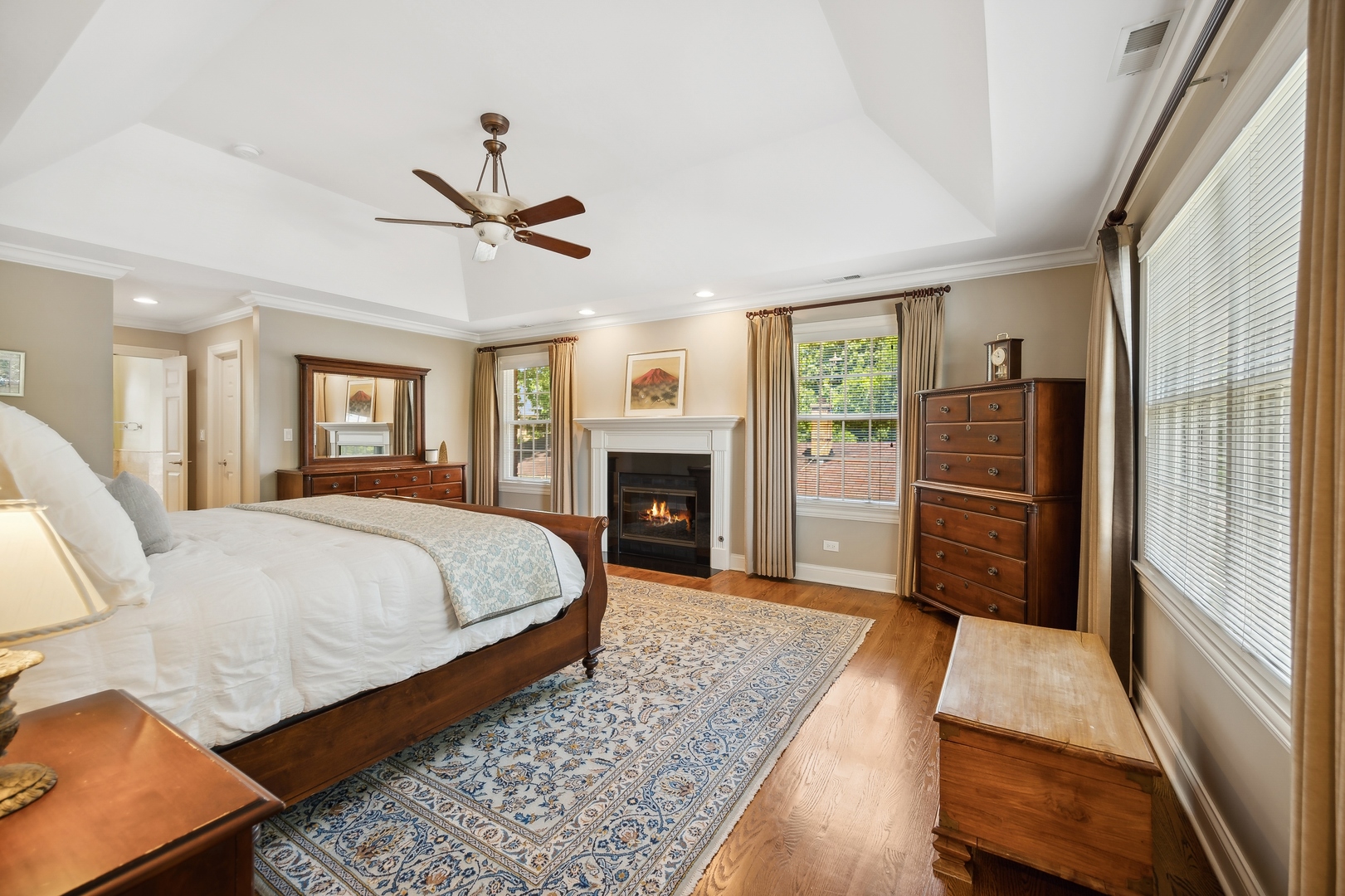 1622 Brandon Road Glenview, IL 60025 - Photo 13 of 31 a bedroom with a bed and a fireplace