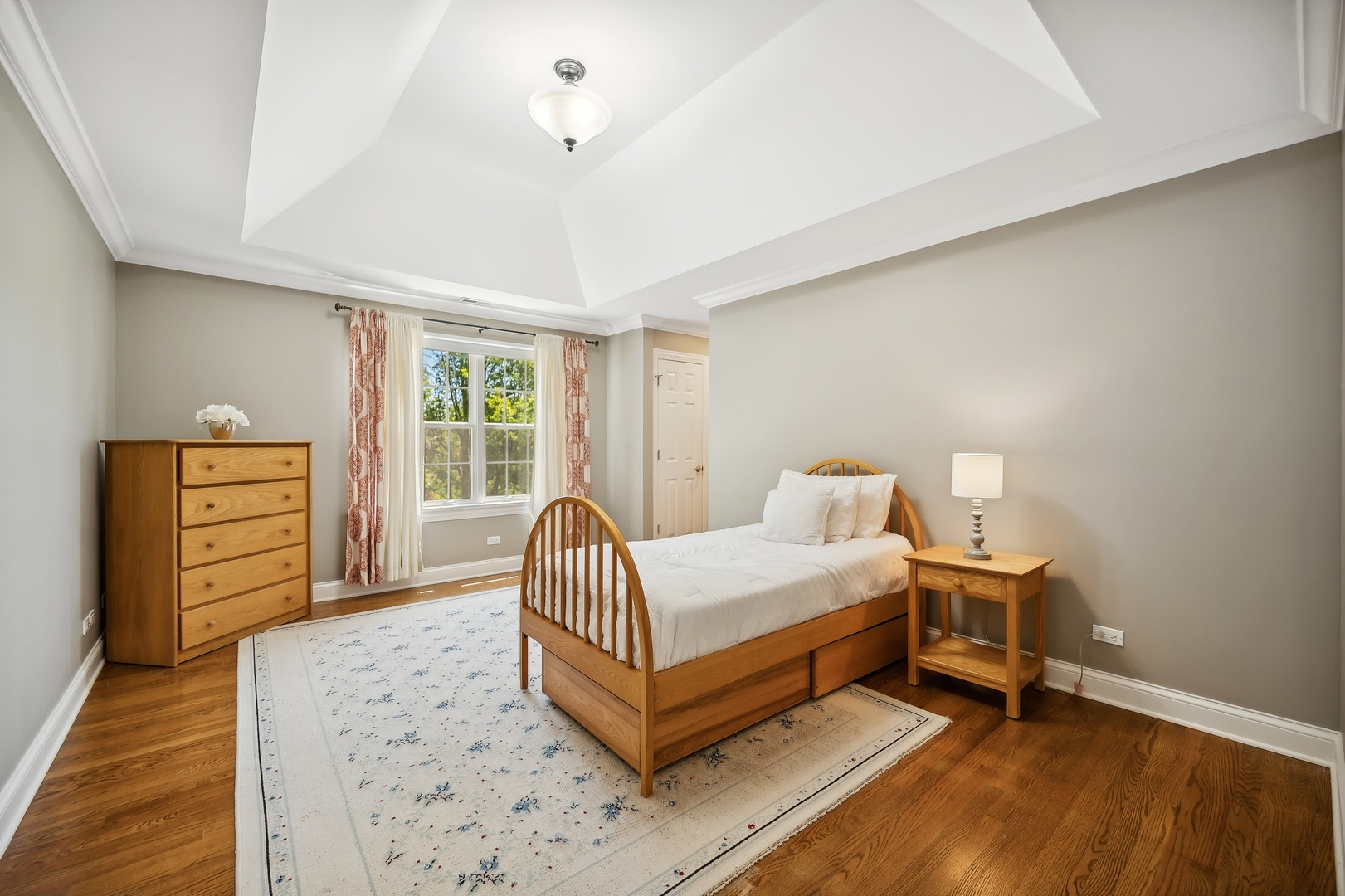 1622 Brandon Road Glenview, IL 60025 - Photo 17 of 31 a bed room with a bed and a chair