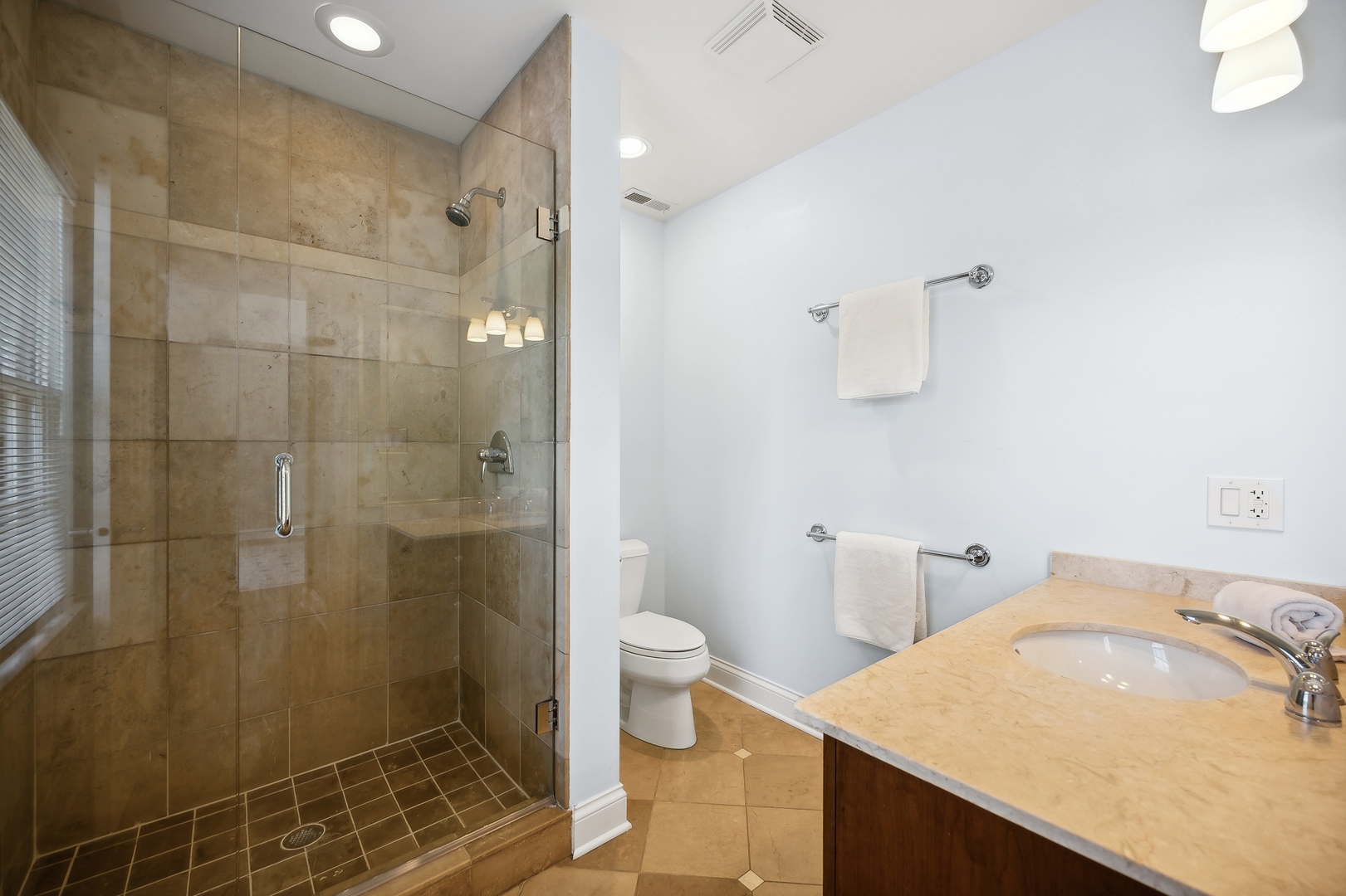 1622 Brandon Road Glenview, IL 60025 - Photo 18 of 31 a bathroom with a sink toilet and shower
