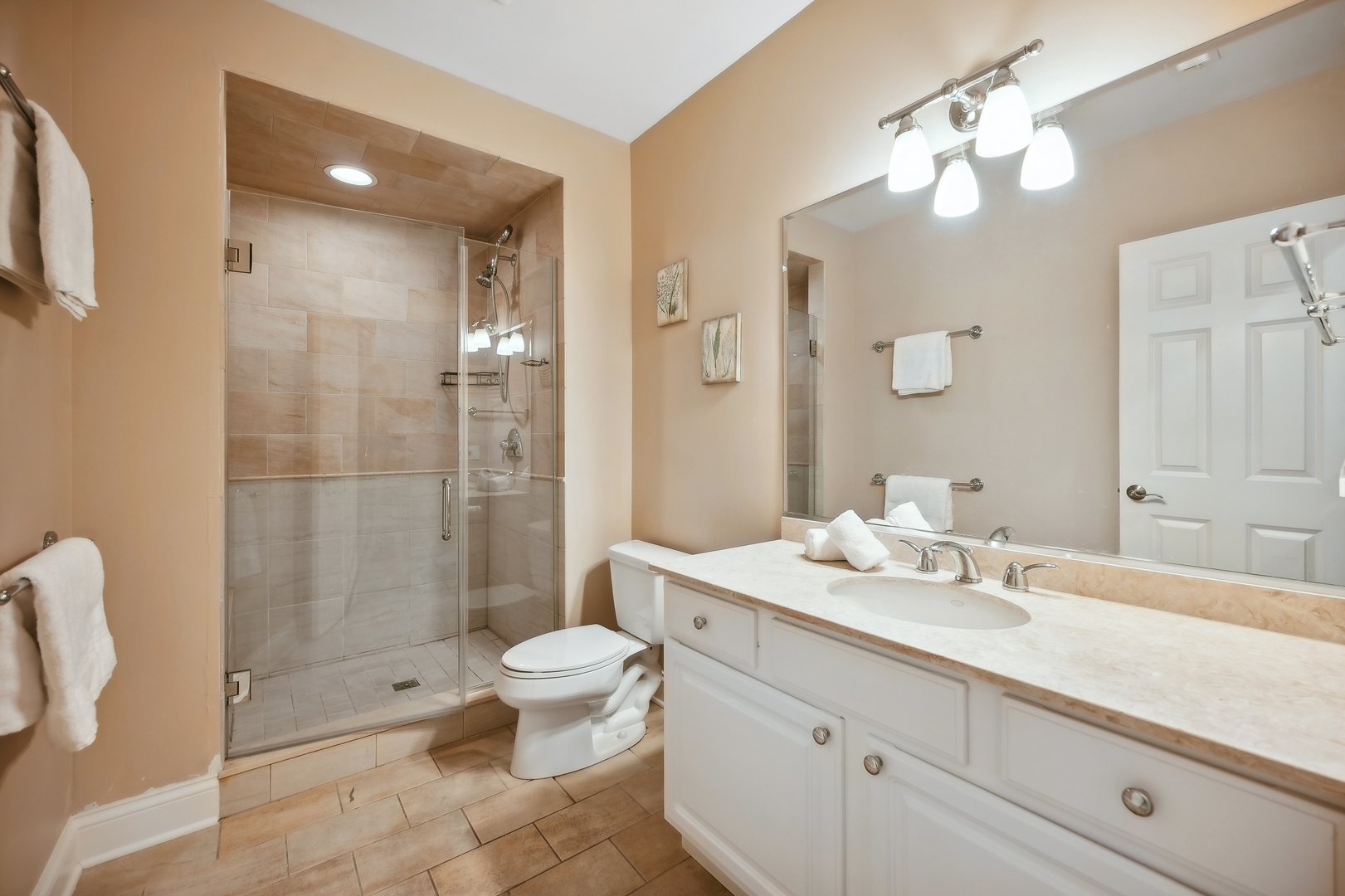 1622 Brandon Road Glenview, IL 60025 - Photo 24 of 31 a bathroom with a sink a toilet and shower