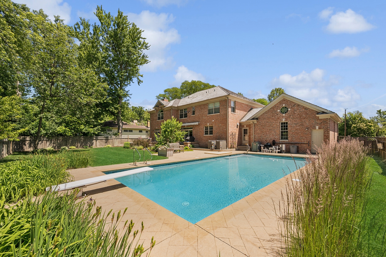 1622 Brandon Road Glenview, IL 60025 - Photo 25 of 31 a view of a house with swimming pool and yard