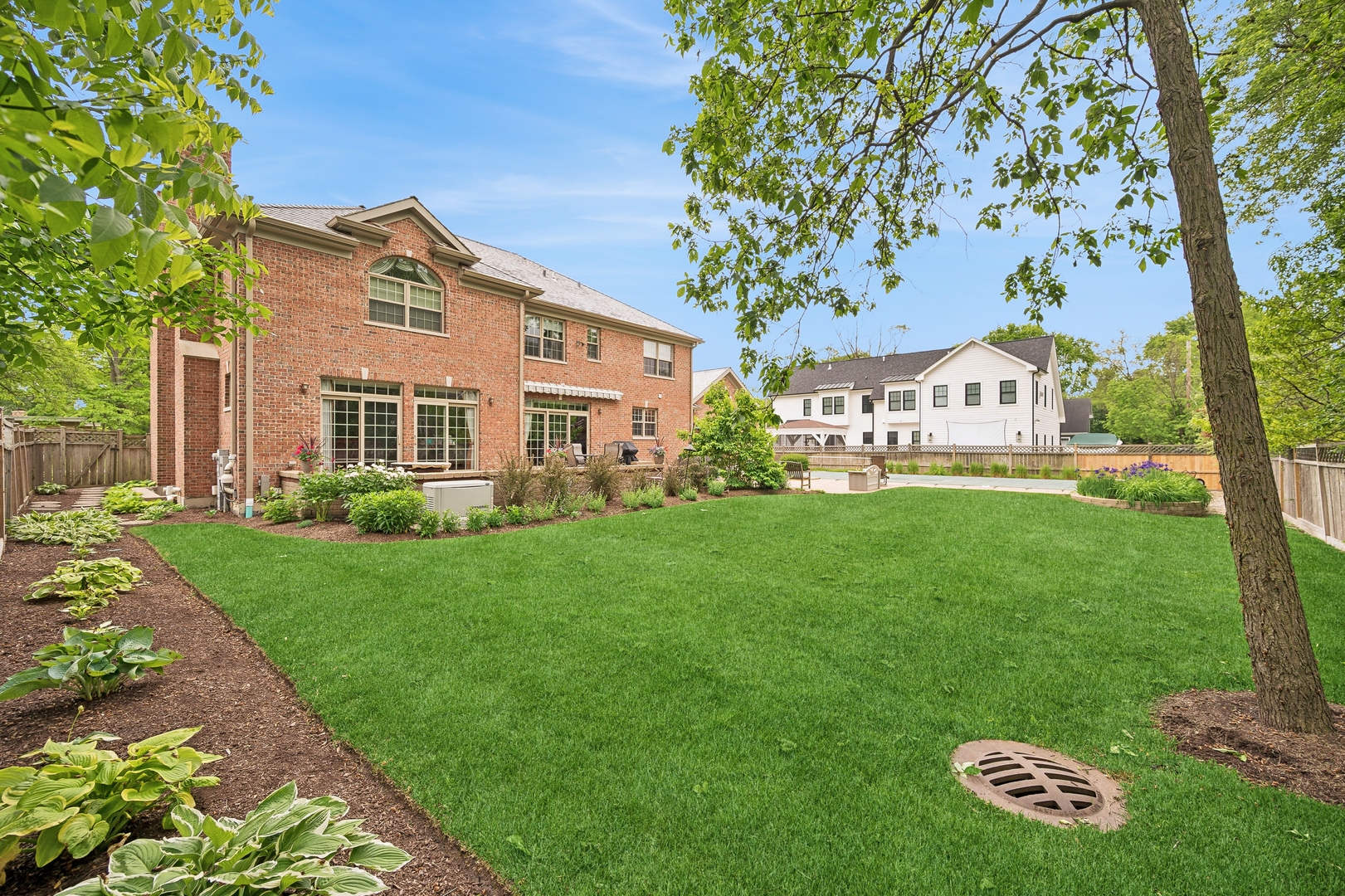 1622 Brandon Road Glenview, IL 60025 - Photo 27 of 31 a front view of a house with a garden