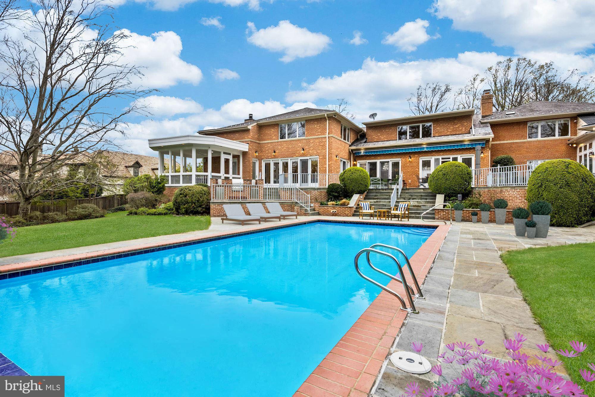 7118 Arrowood Road Bethesda, MD 20817 - Photo 55 of 59 Flagstone Framed Lap Pool with Electric Cover