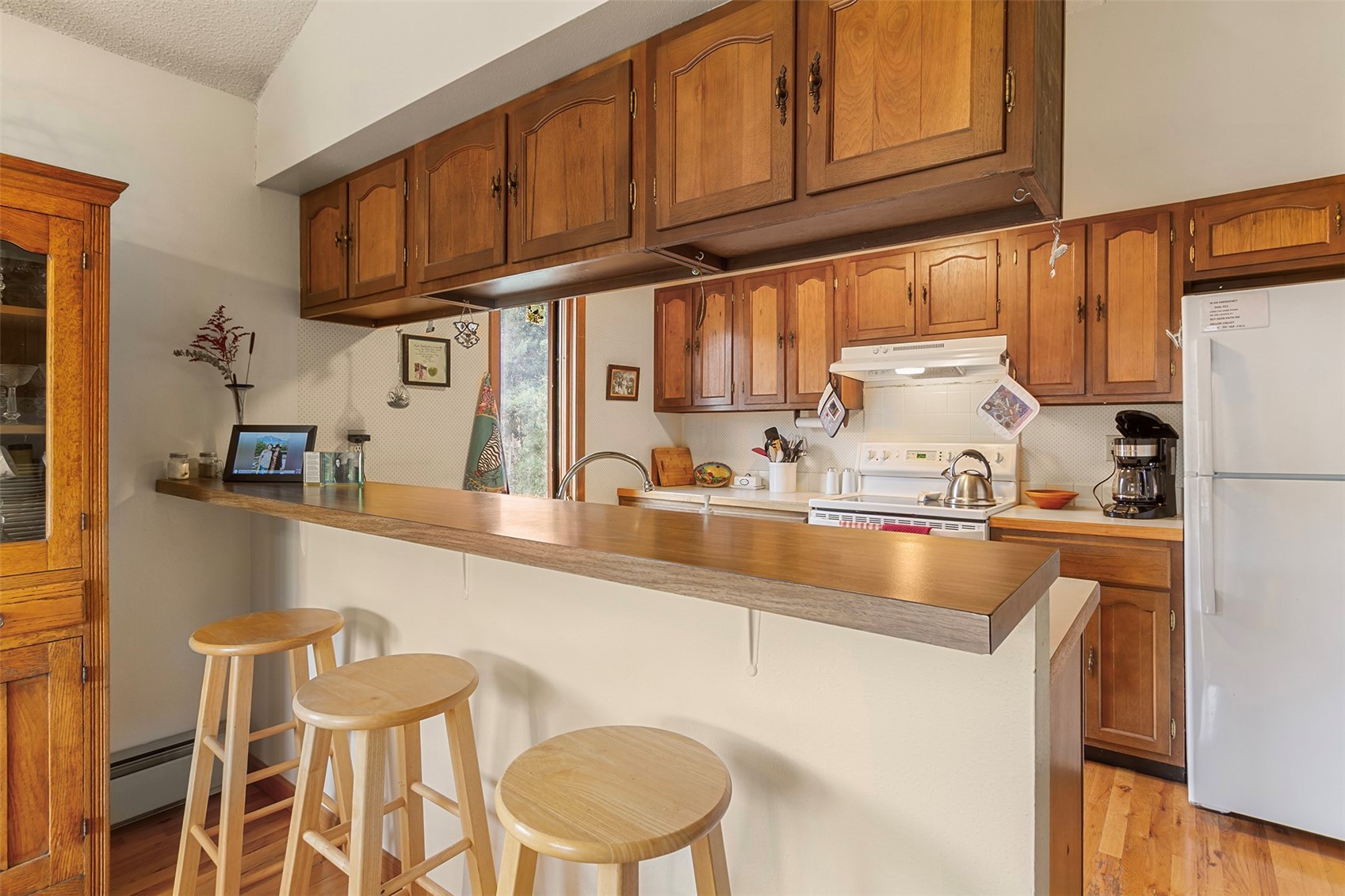 857 Deer Path Road Dillon, CO 80435 - Photo 9 of 29 a kitchen with stainless steel appliances granite countertop a sink a stove and a refrigerator