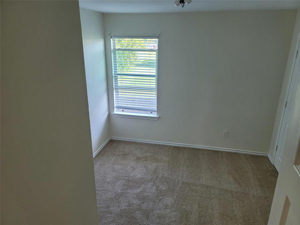 1256 Redman Avenue Mesquite, TX 75149 - Photo 5 of 8 an empty room with a window