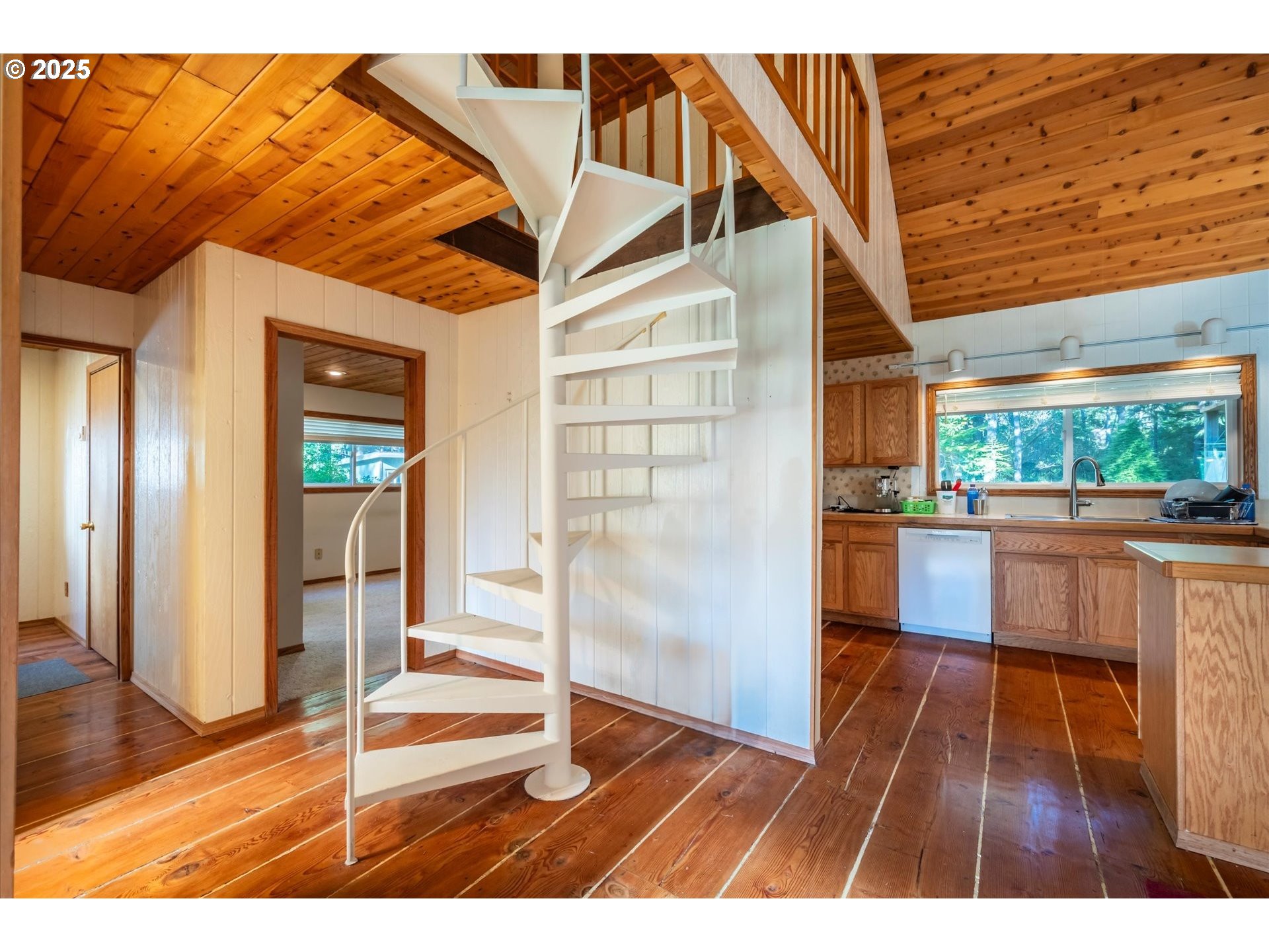 54177 Morrison Road Bandon, OR 97411 - Photo 20 of 47 a view of a living room and a wooden floor