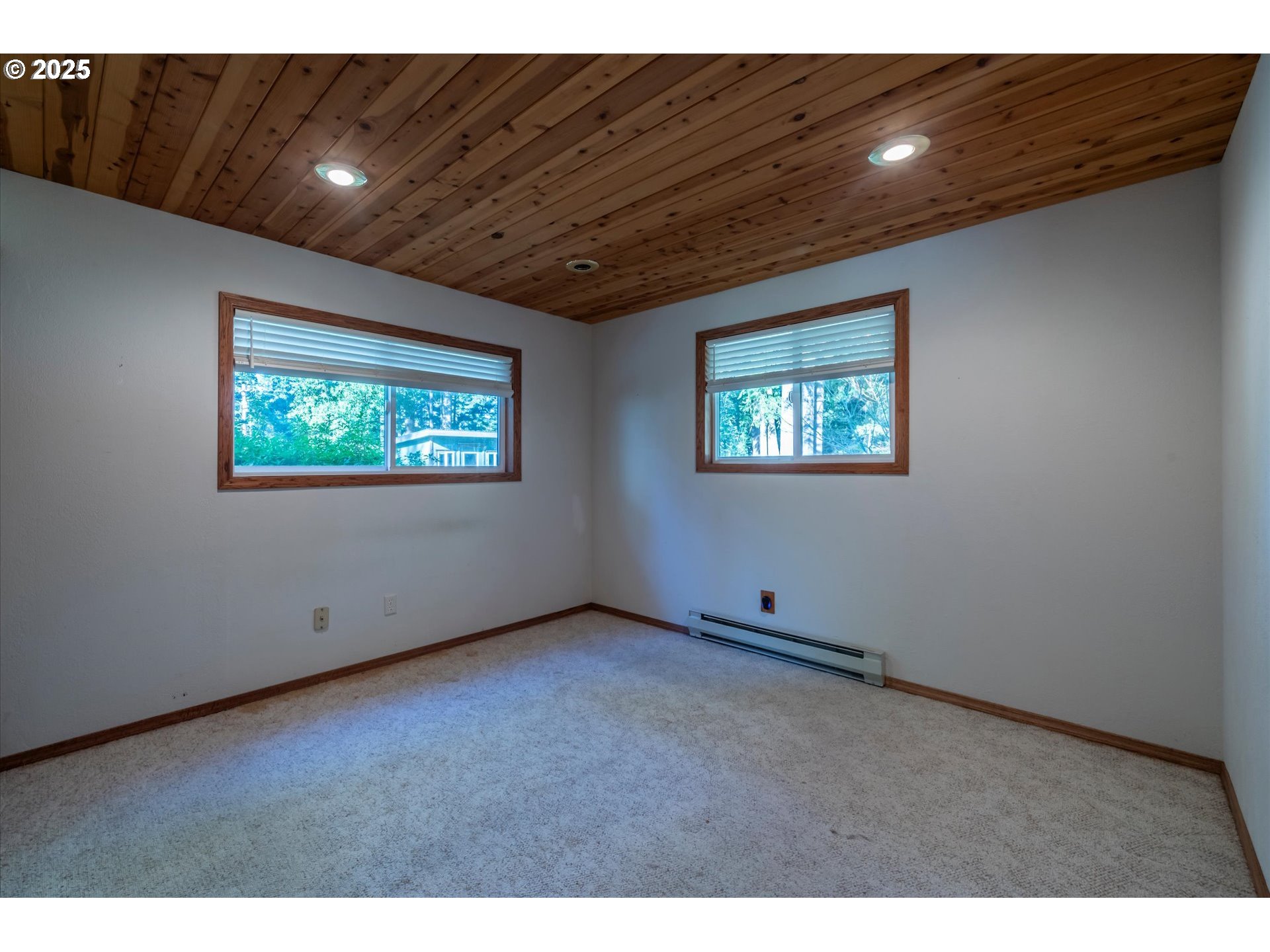 54177 Morrison Road Bandon, OR 97411 - Photo 27 of 47 a view of an empty room with windows