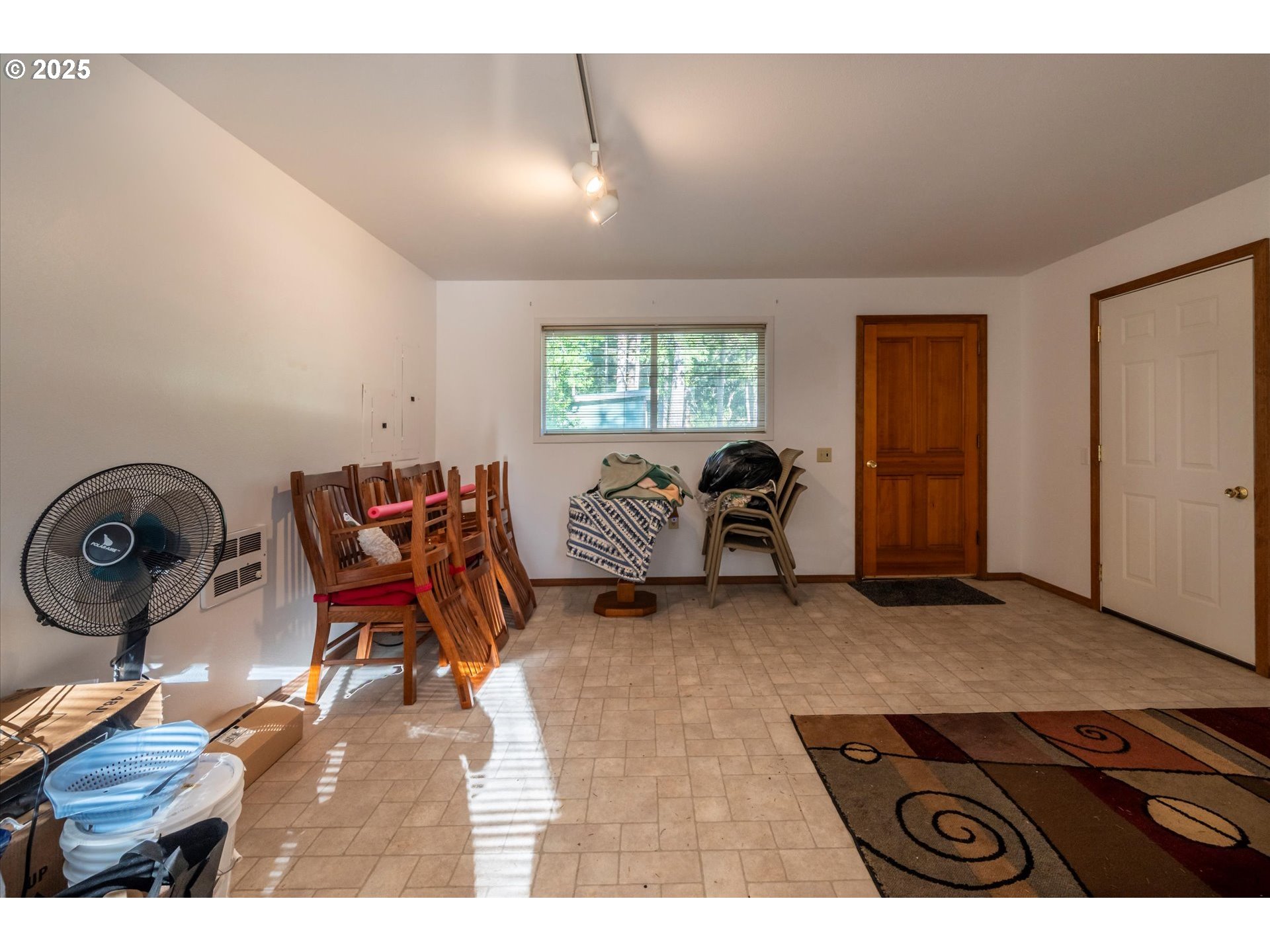 54177 Morrison Road Bandon, OR 97411 - Photo 32 of 47 a living room with furniture and a window