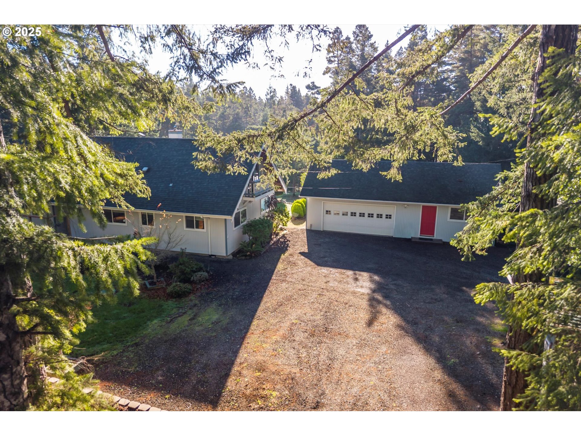 54177 Morrison Road Bandon, OR 97411 - Photo 46 of 47 a view of a yard in front of house