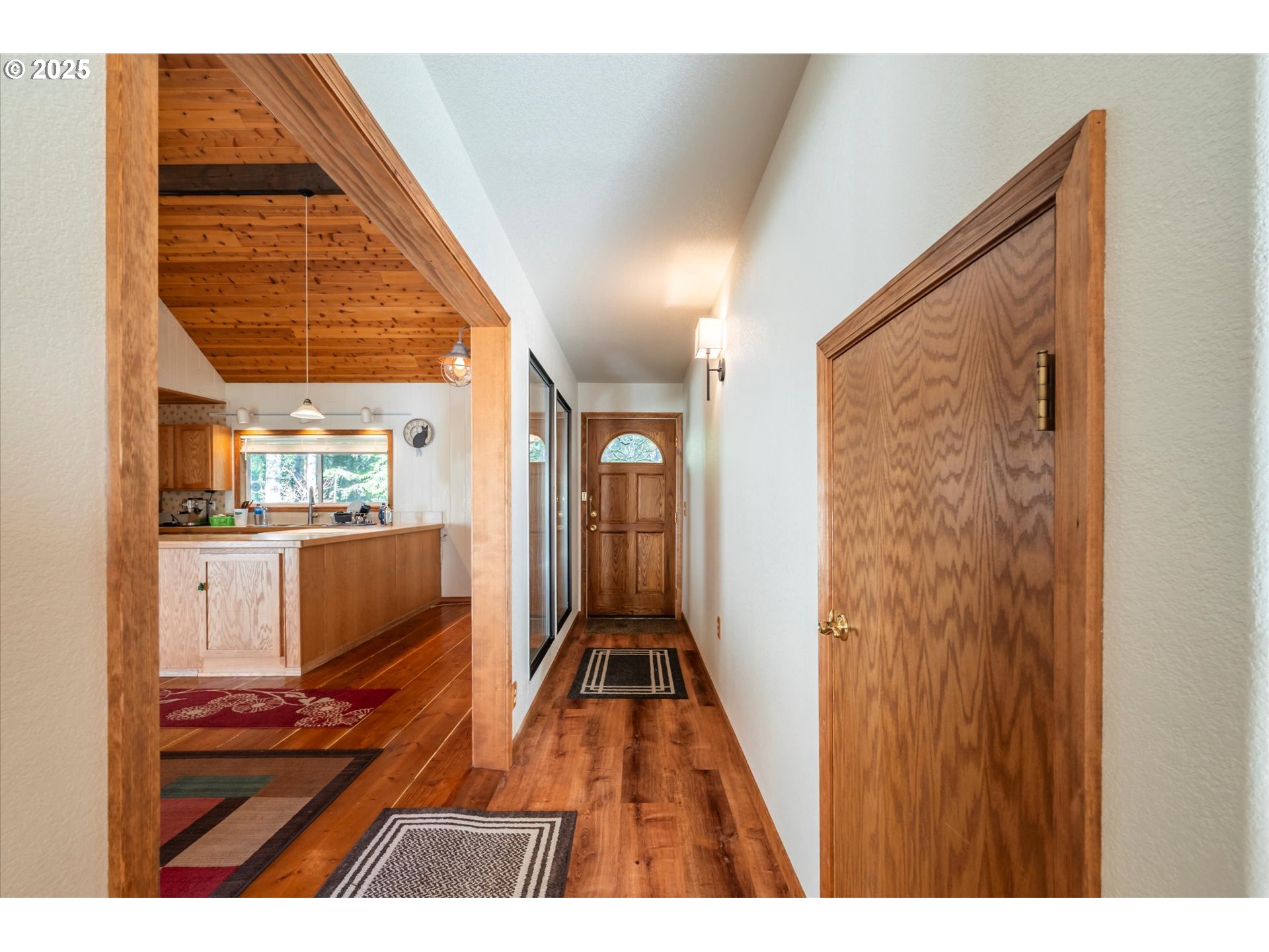 54177 Morrison Road Bandon, OR 97411 - Photo 6 of 47 a view of a living room and bathroom