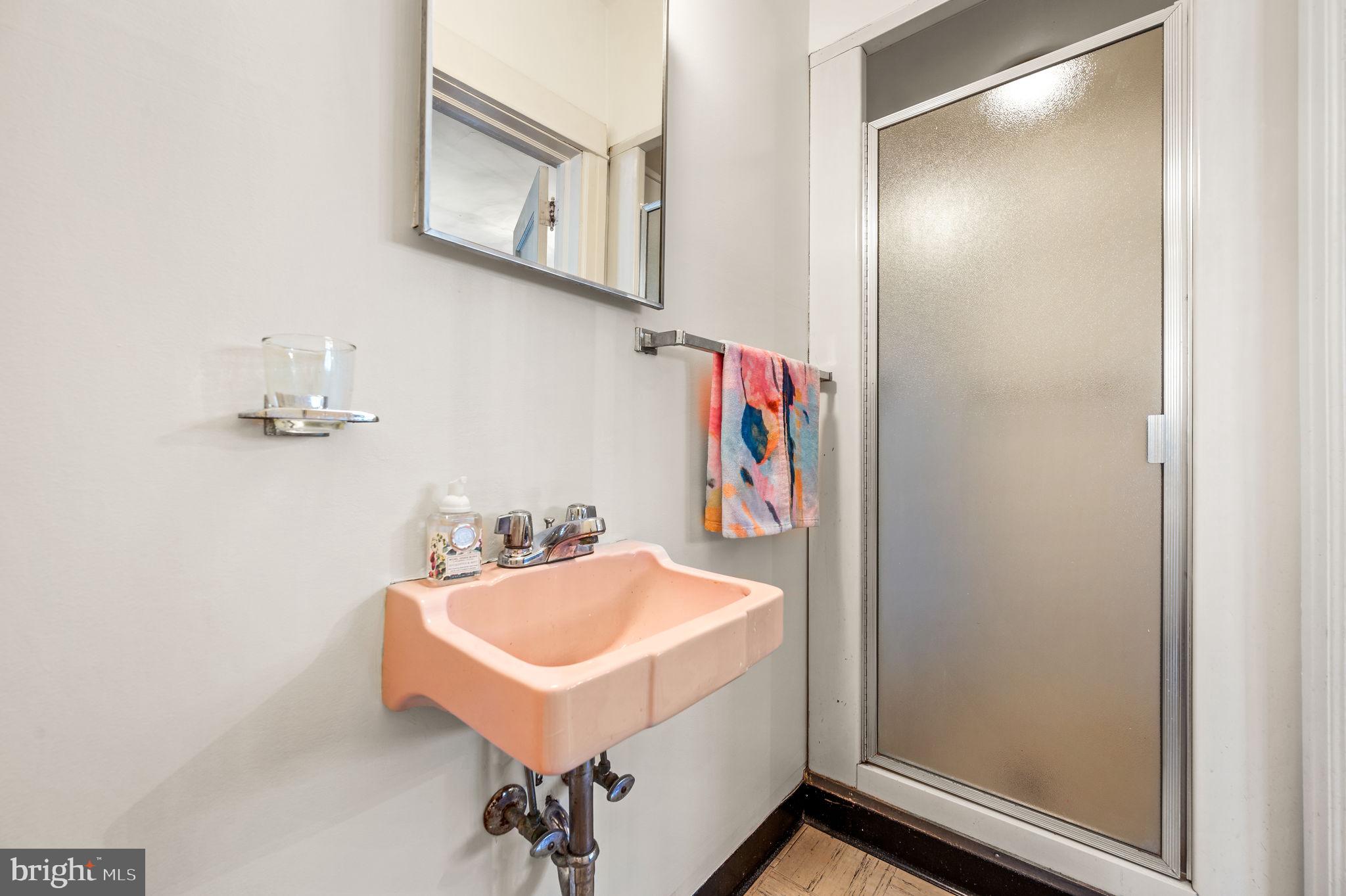 281 Wayne Avenue Lansdowne, PA 19050 - Photo 15 of 28 a bathroom with a sink and mirror
