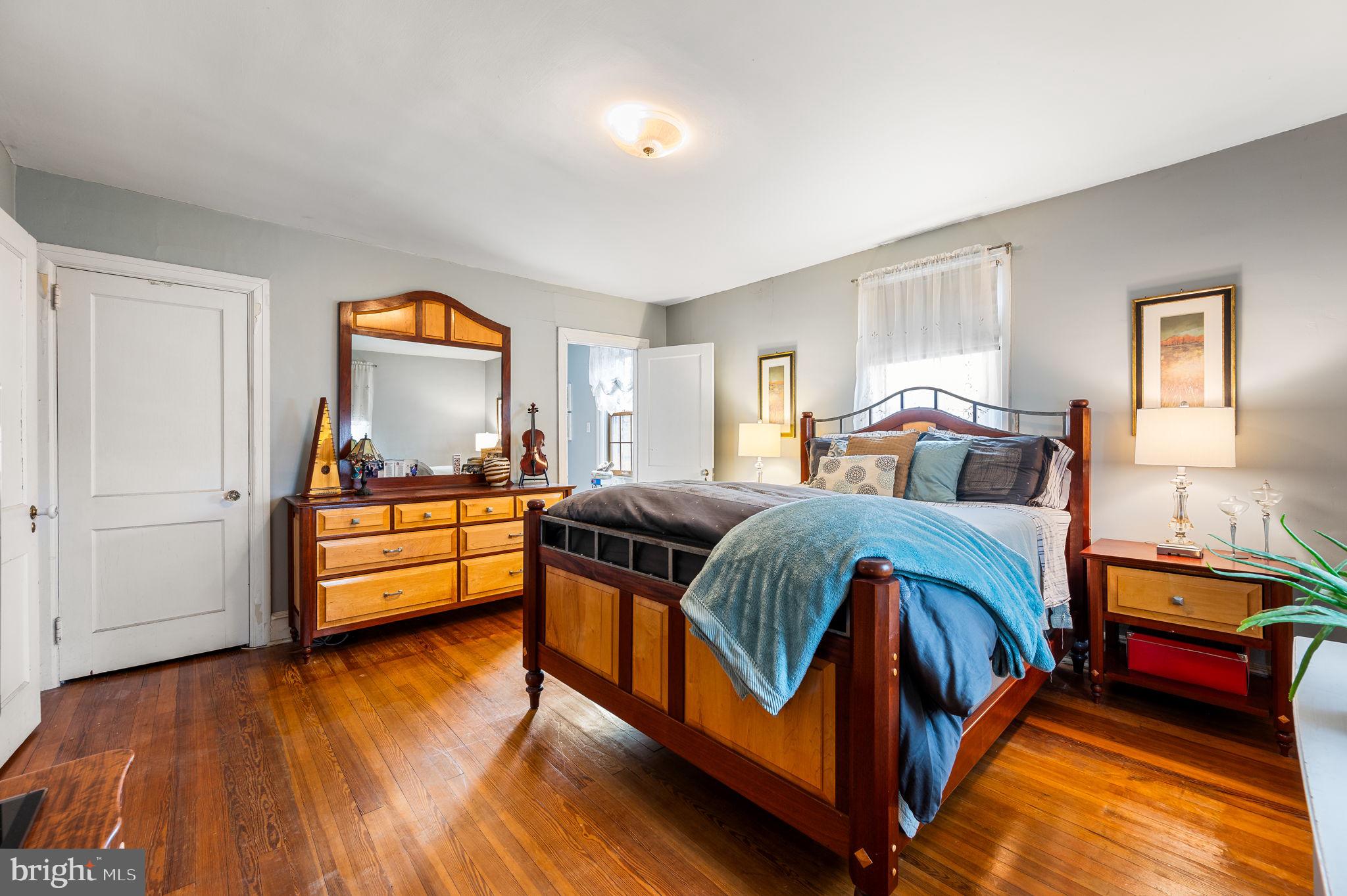 281 Wayne Avenue Lansdowne, PA 19050 - Photo 16 of 28 a bedroom with a bed and a view of kitchen