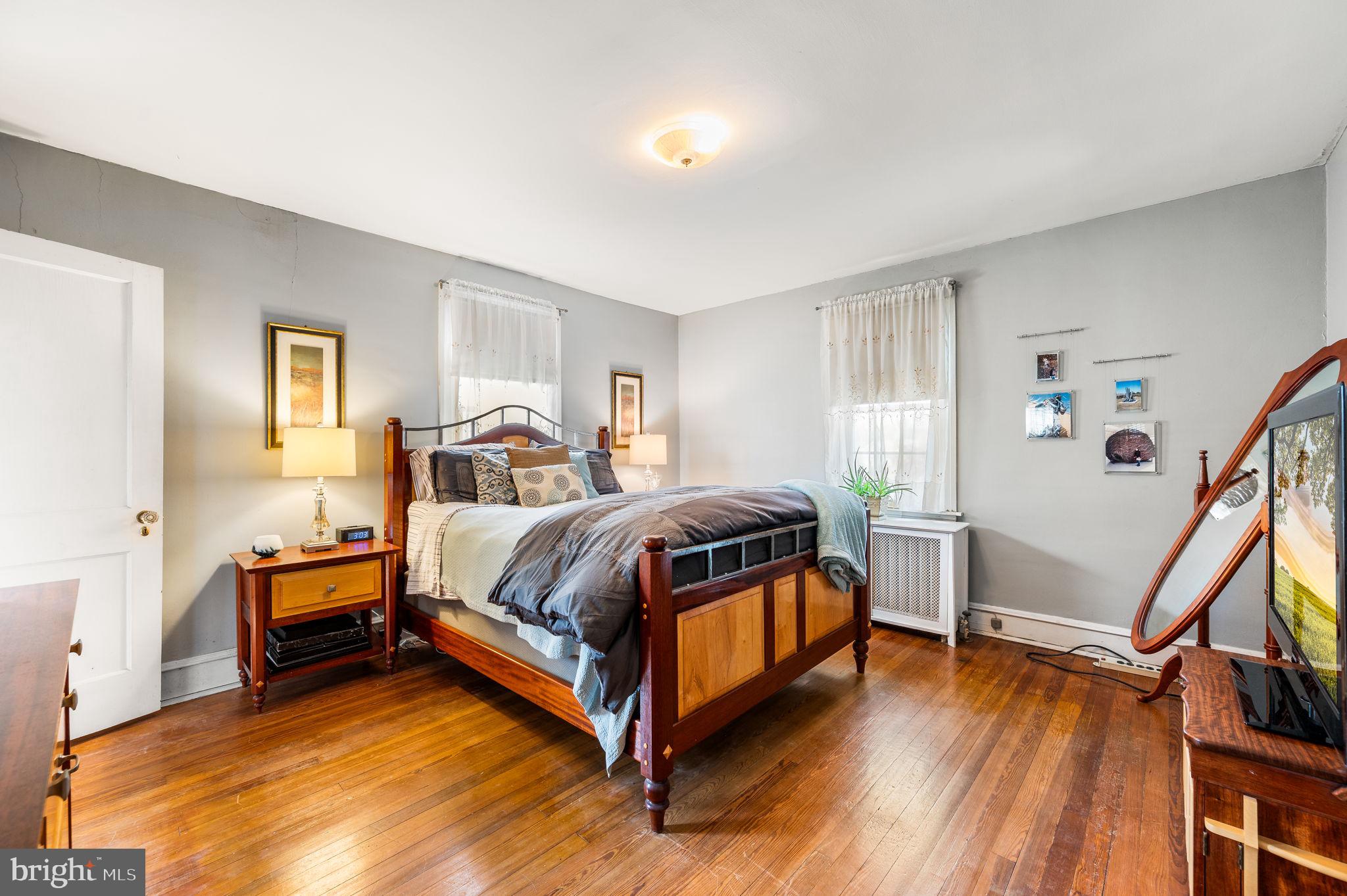281 Wayne Avenue Lansdowne, PA 19050 - Photo 17 of 28 a bedroom with a bed and a window
