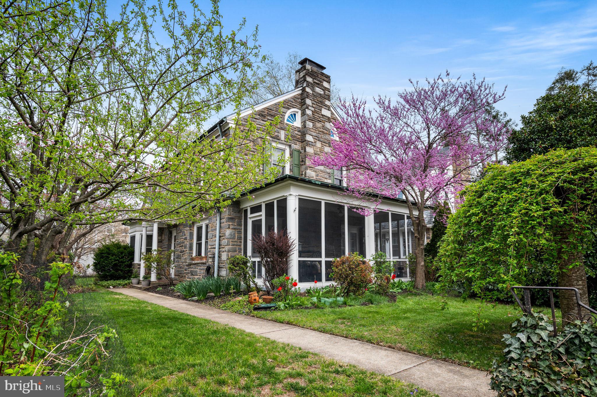 281 Wayne Avenue Lansdowne, PA 19050 - Photo 26 of 28 a view of a brick house with a big yard and large trees