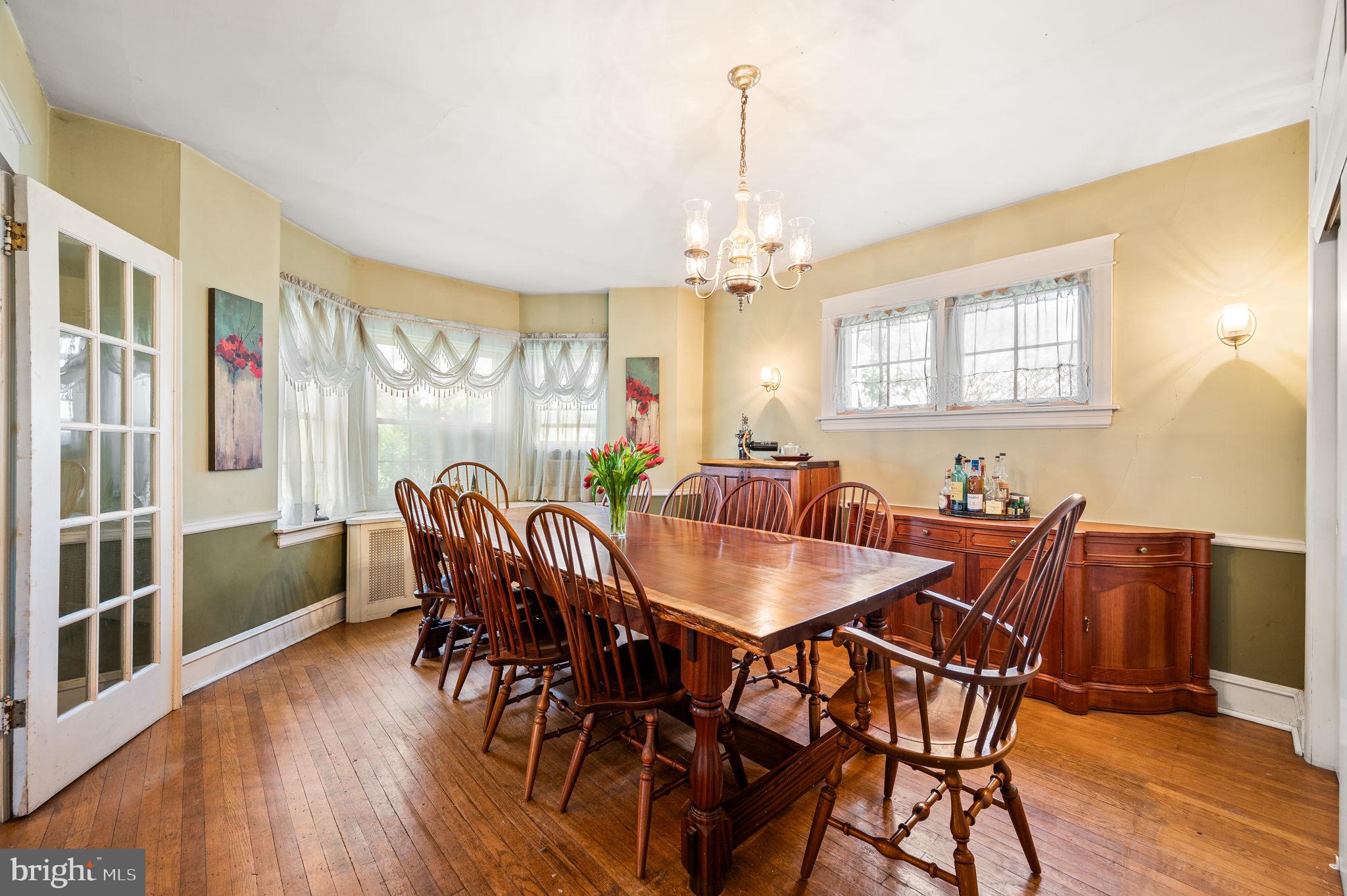281 Wayne Avenue Lansdowne, PA 19050 - Photo 9 of 28 a view of a dining room with furniture window and wooden floor