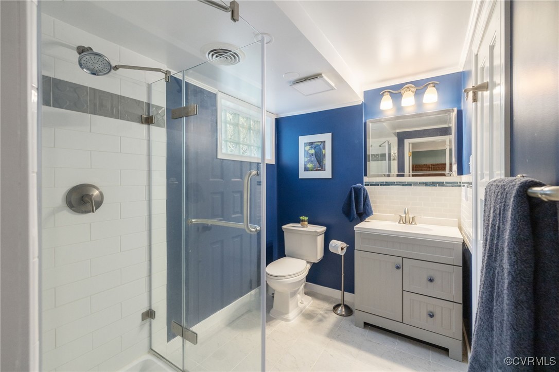 4 Westwick Road Henrico, VA 23238 - Photo 38 of 45 Tile back splash, storage, shower with tile