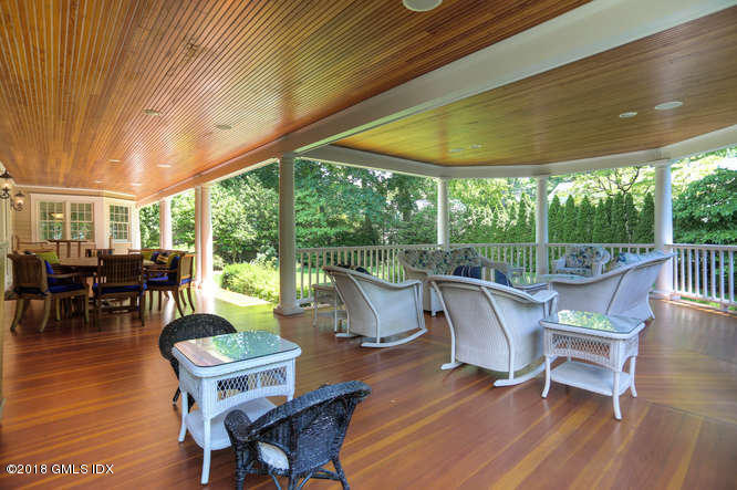 34 Hendrie Avenue Riverside, CT 06878 - Photo 23 of 28 a building outdoor space with patio furniture and wooden floor