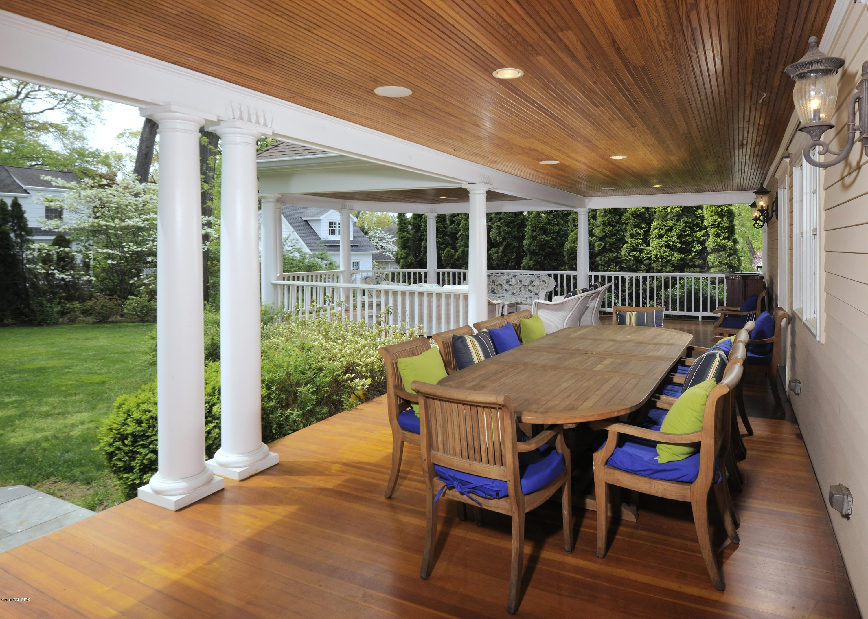 34 Hendrie Avenue Riverside, CT 06878 - Photo 3 of 28 a view of a patio with a table chairs and a backyard